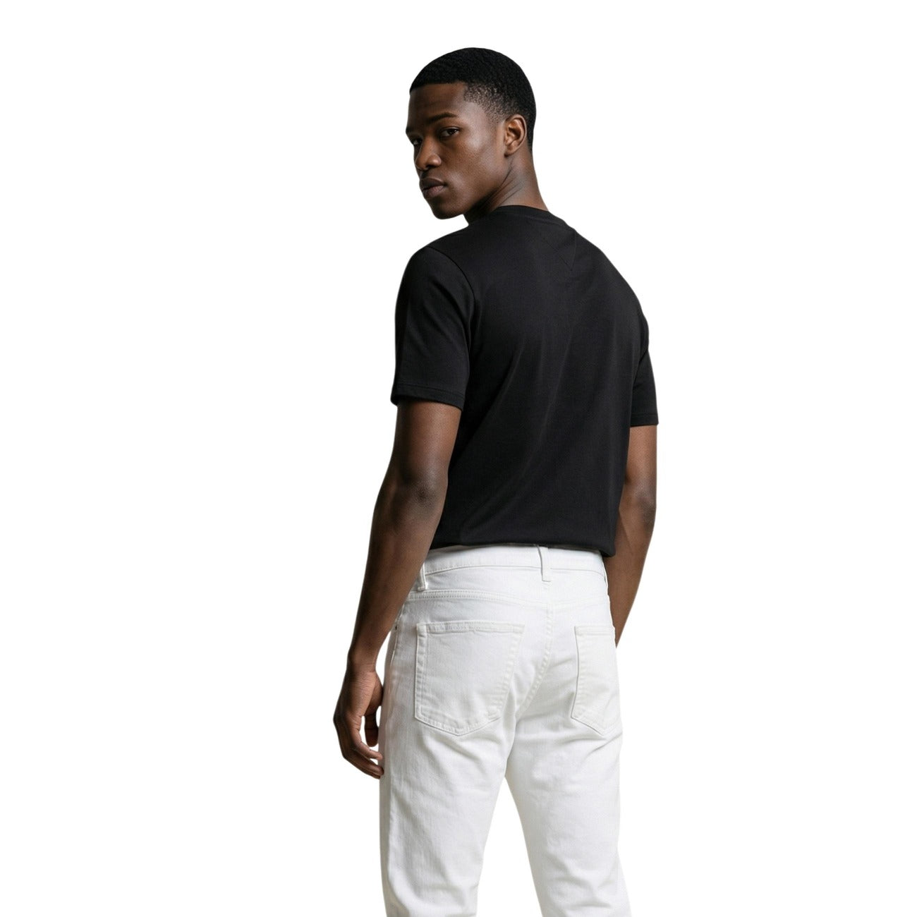 T-shirt uomo Tommy Hilfiger Jeans nera in cotone a maniche corte con stampa logo e scollo tondo

