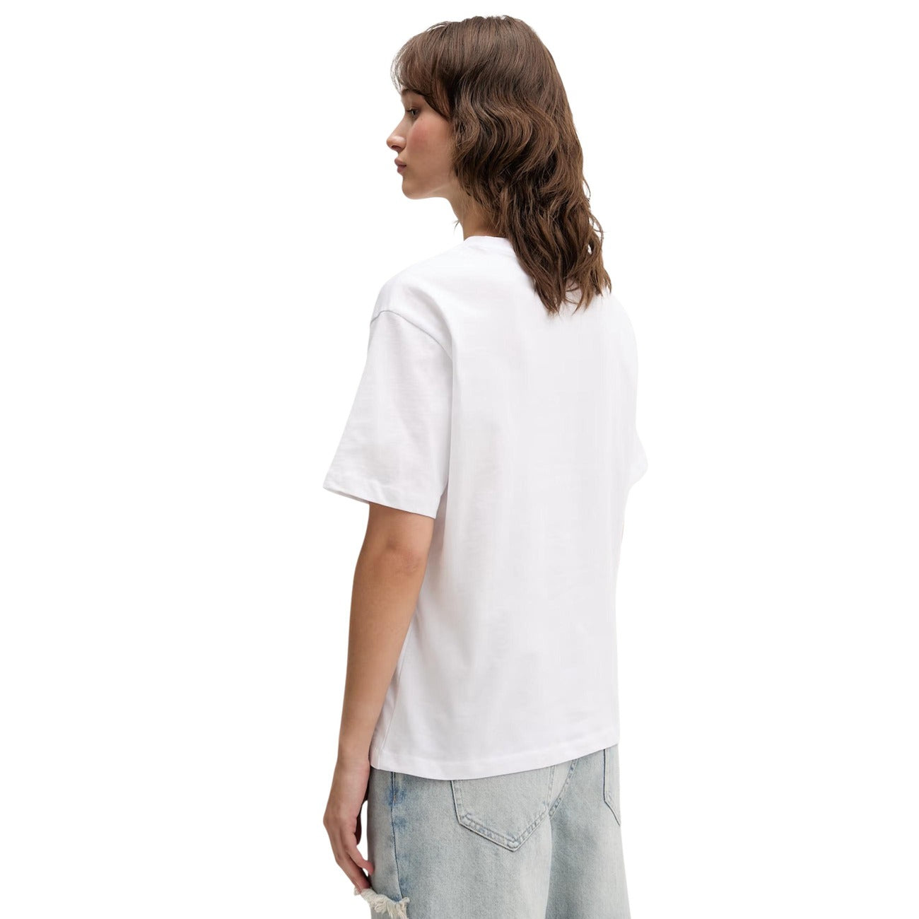 T-shirt Karl Lagerfeld Jeans Bianca; 100% Cotone Organico. Logo floreale frontale, vestibilità relaxed, scollo tondo. Tessuto leggero e traspirante, stile casual-elegante. Vista posteriore laterale 