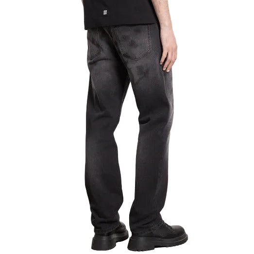 Jeans Givenchy uomo grigi in cotone - vista frontale indossata da modello
