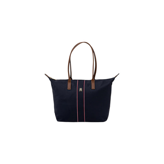Borsa Tommy Hilfiger Nylon Tote; Chiusura con zip, tracolla rimovibile, nastro iconico TH. Capienza 7 litri, materiale leggero e resistente. Design moderno con manici a contrasto. Vista frontale 