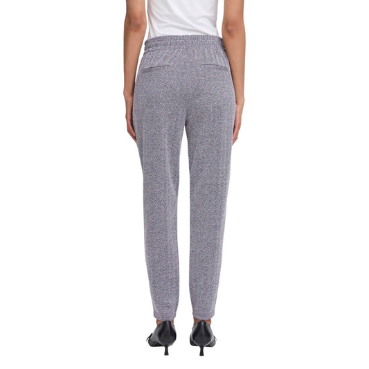 Pantaloni Skinny ICHI Ihkate; Motivo Spinato Blu. Vita alta elastica, tessuto jacquard elasticizzato. Vestibilità aderente e confortevole. Capo versatile per outfit casual-chic e formali. Vista posteriore 