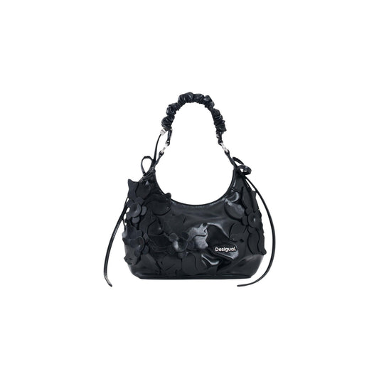 Borsa Desigual donna nera modello BAG_NEXUS BIRA. Borsa a mano piccola in ecopelle nera con fiori 3D applicati in rilievo, manico a braccio arricciato, fiocchi laterali e tracolla rimovibile, borsa elegante e casual stile bon ton per la collezione autunno inverno.