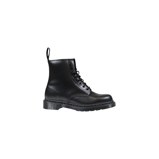 Anfibi Dr Martens 1460 Mono neri unisex. Stivaletti classici 8 fori in pelle liscia rigida Smooth con lavorazione Goodyear, suola ammortizzata nera, fettuccia posteriore e dettagli tono su tono.