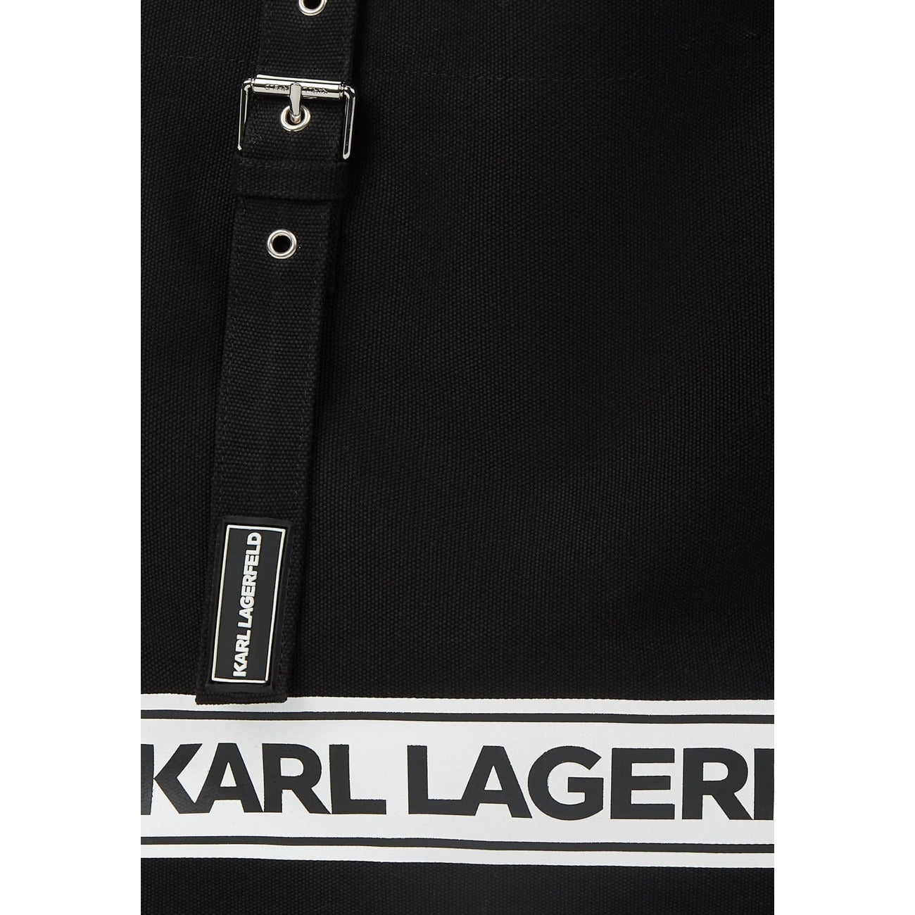 Beach Bag Karl Lagerfeld; 100% Cotone (60% Riciclato). Silhouette strutturata 60cm, manici con fibbie, logo a righe. Borsa mare maxi, spaziosa e di lusso, perfetta per la PE26. Dettaglio logo