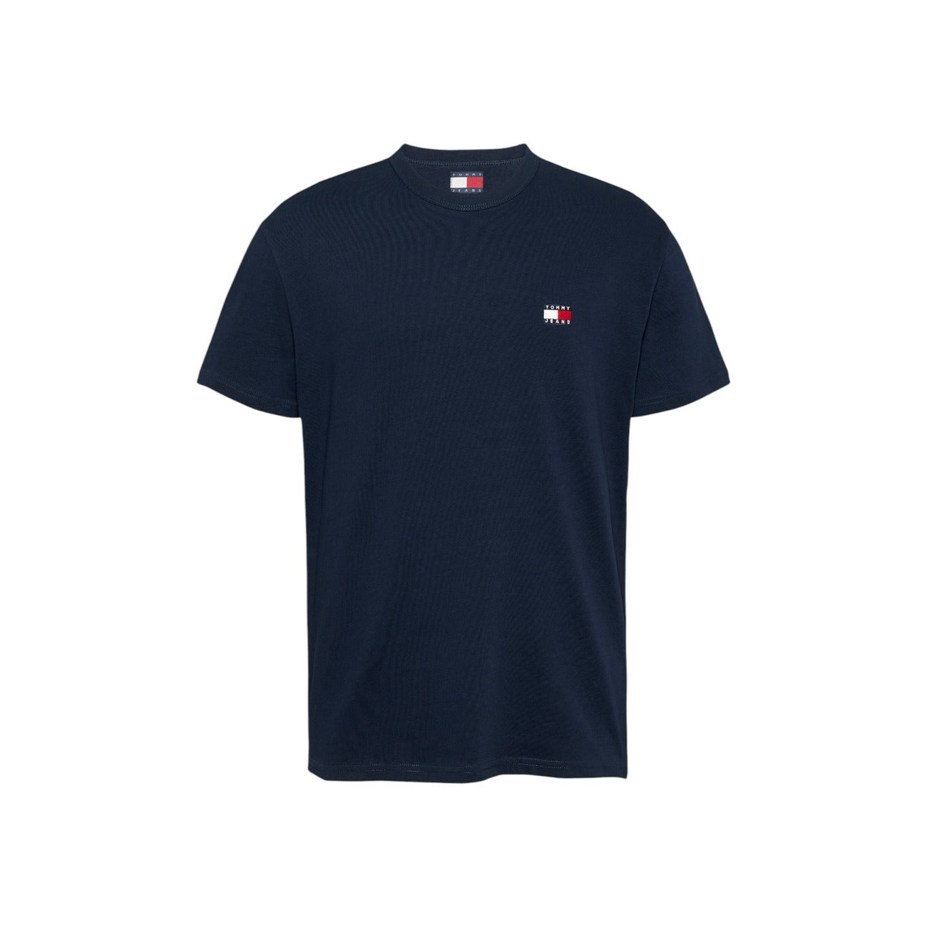 T-shirt Tommy Hilfiger Jeans Badge; 100% Cotone rigenerato. Vestibilità regular, scollo a girocollo, maniche corte. Logo badge ricamato, disponibile in vari colori. Stile casual eco-friendly. Blu scuro vista stesa 