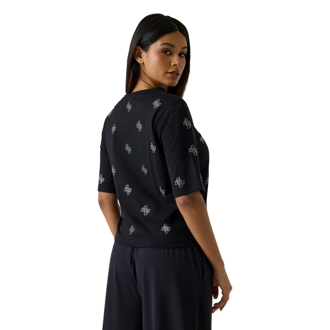 T-shirt Guess Silvy Nera; 100% Cotone. Motivo 4G con microstrass, vestibilità ampia (wide fit), scollo tondo. Capo versatile della linea Guess Active, stile glamour-casual. Vista posteriore 