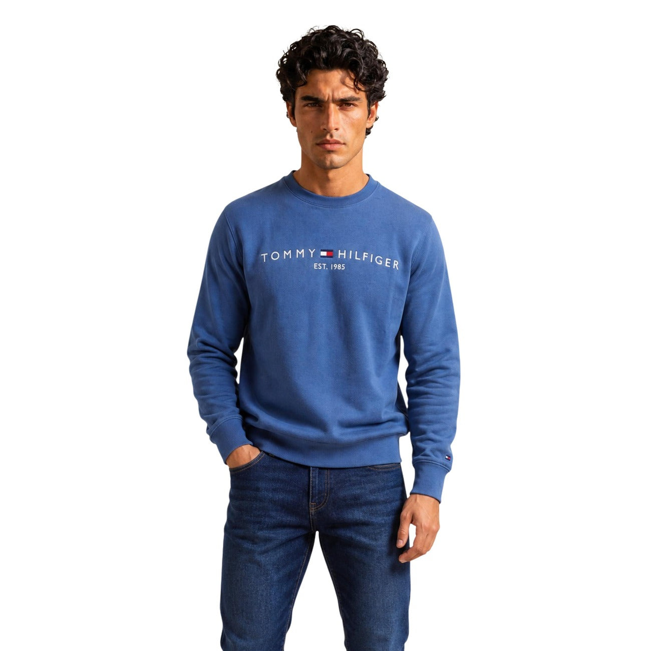 Felpa Tommy Hilfiger uomo girocollo blu Aegean Sea MW0MW11596. Felpa casual in cotone felpato con scollo tondo, finiture a coste, logo stampato sul petto e iconica bandierina sul polsino, abbigliamento uomo autunno inverno.