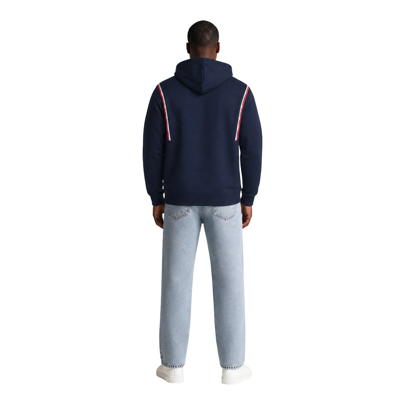 Felpa Cappuccio Uomo Tommy Hilfiger Jeans; Blu. 100% cotone rigenerato con tasca a marsupio, bande logo sulle spalle e scritte ricamate. Polsini a coste e vestibilità regolare, stile urban-casual. Figura intera posteriore 