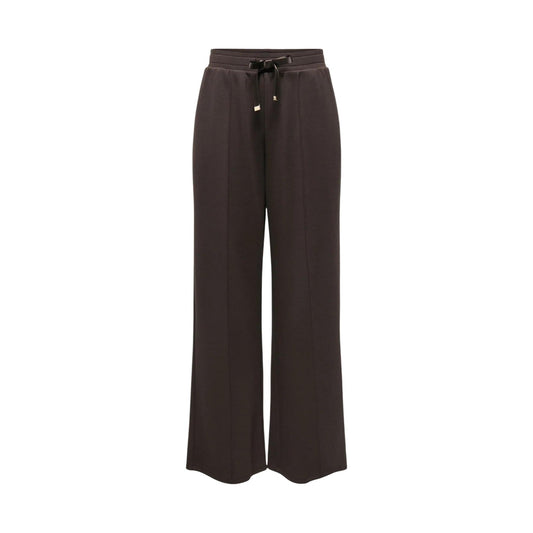 Pantaloni tuta marrone donna Only Onlmyra 15380274. Pantaloni casual a gamba dritta e vestibilità ampia in poliestere riciclato e viscosa, con coulisse regolabile e piega centrale cucita.