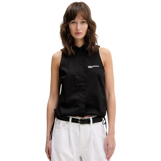 Camicia Popeline Smanicata; 97% Cotone, 3% Elastan. Coulisse regolabili, colletto a punta, logo ricamato. Top donna sartoriale, fresco e stretch per la PE26. Colore nero 
