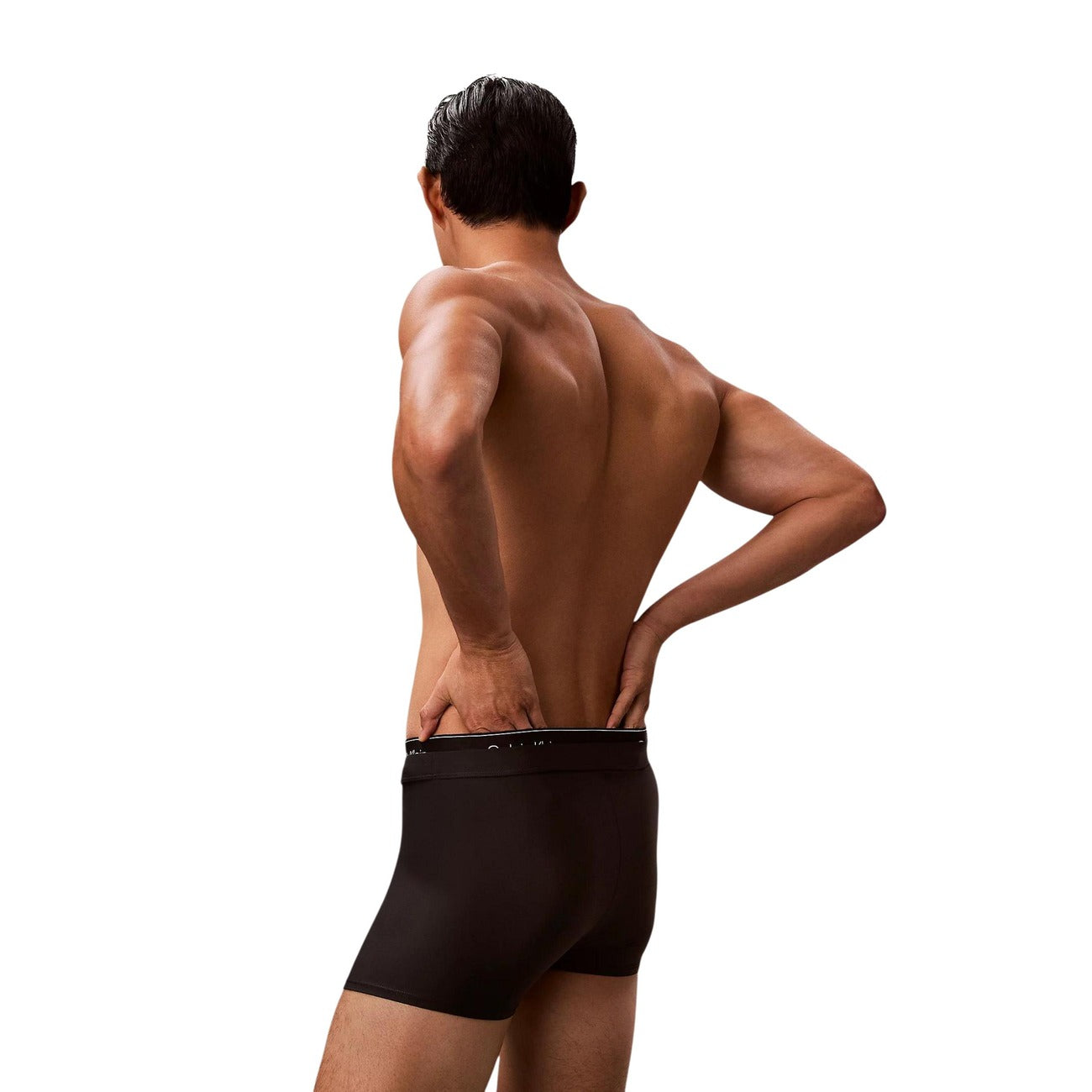 Slip Mare Calvin Klein Vita Media; Nero. Jersey di nylon elasticizzato "Quick Dry". Doppia fascia logata tono su tono, interamente foderato, tessuto anti-umidità Vista posteriore 