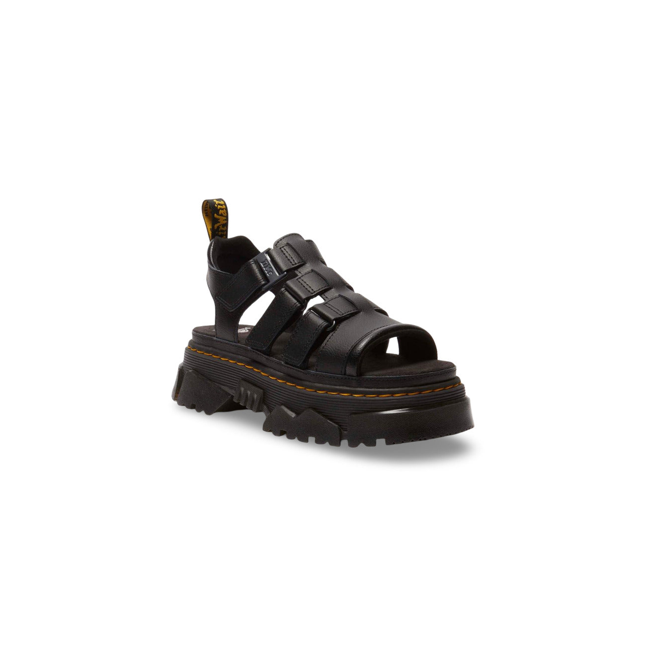 Dr. Martens Sandalo Mattison Platform; Nero. 100% Pelle Athena opaca. Tacco 5 cm, suola ibrida EVA/PVC, sottopiede in camoscio e chiusura a fibbia. Dettagli originali Dr. Martens con cuciture gialle. Frontale 