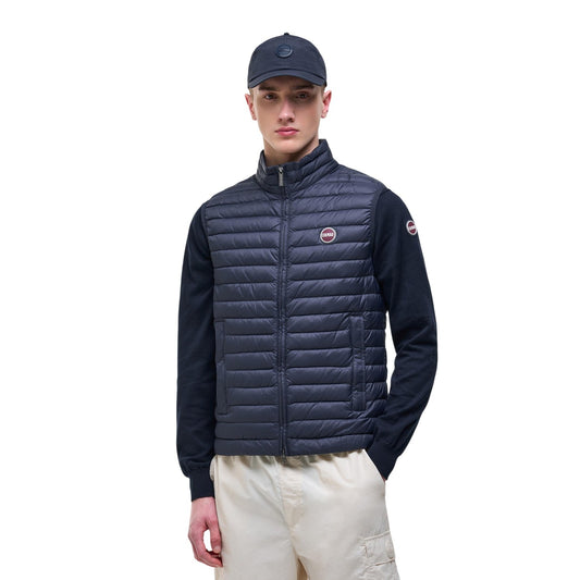 Gilet uomo Colmar Originals blu navy 100 grammi 1248 8VX. Smanicato leggero da uomo blu scuro idrorepellente con imbottitura in piuma, chiusura zip doppio cursore, coulisse sul fondo e logo al petto, gilet da mezza stagione casual sportivo.