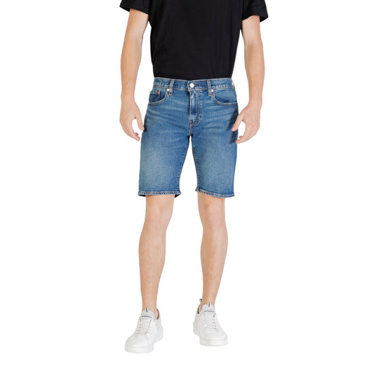 Pantaloncini Levi's 405 Standard Shorts, colore blu denim medio, orlo sfrangiato e vestibilità regular; composizione 99% cotone e 1% elastane con chiusura a bottone e zip. Vista frontale 