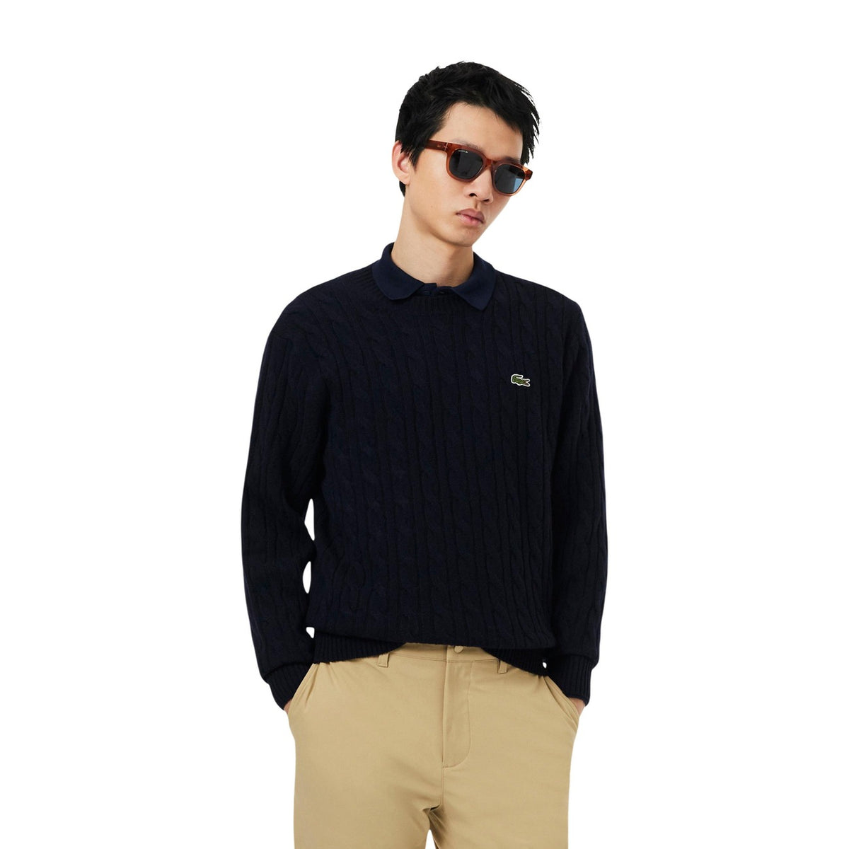 Maglione lana trecce uomo Lacoste AH2924-00. Pullover invernale pesante in lana girocollo blu e verde con bordi a coste e logo coccodrillo Lacoste.