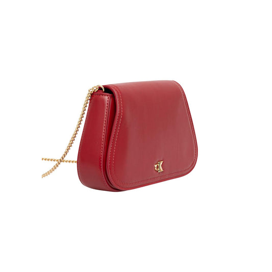 Pochette Calvin Klein rossa con catena CK Curved On Chain LV04F1153G. Mini bag da sera rossa da donna con logo monogramma CK dorato, tracolla a catena oro e chiusura zip, borsa elegante e sostenibile 4 stagioni.