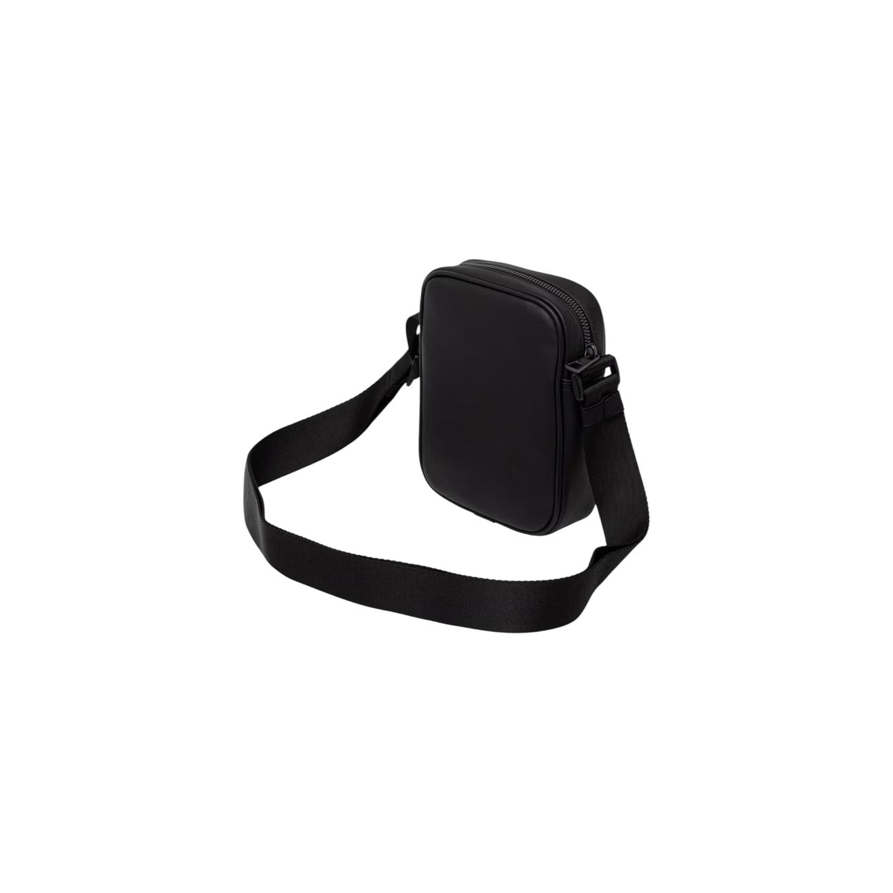 Borsa Reporter Uomo Tommy Hilfiger TH Metro; Nero. 100% Poliuretano liscio, chiusura superiore con zip, tracolla regolabile e nastro iconico frontale. Misure verticali e compatte (15x20 cm), capienza 1,85 litri. Posteriore 
