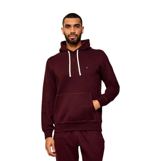 Felpa Tommy Hilfiger uomo bordeaux con cappuccio MW0MW39997. Felpa in misto cotone spazzolato effetto manopesca con tasca a marsupio frontale, coulisse a contrasto e logo ricamato, abbigliamento uomo autunno inverno.