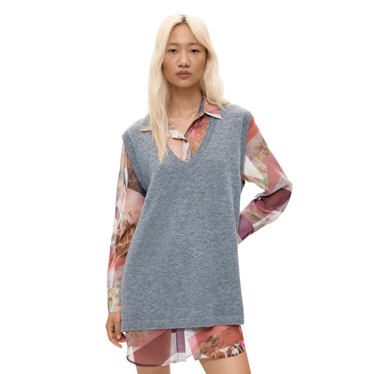 Vestito Desigual donna grigio e multicolor modello VEST_NANTES. Abito corto regular fit stile camicia con corpino grigio unito, maniche lunghe velate stampate, colletto a camicia e abbottonatura sul davanti, stile casual chic originale.