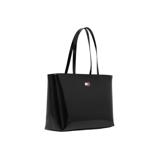 Borsa Tote donna Tommy Hilfiger; 100% Poliuretano Nero. Chiusura con cerniera, manici lunghi a spalla, logo piccolo frontale. Capiente, resistente e ideale per il lavoro. Frontale laterale 