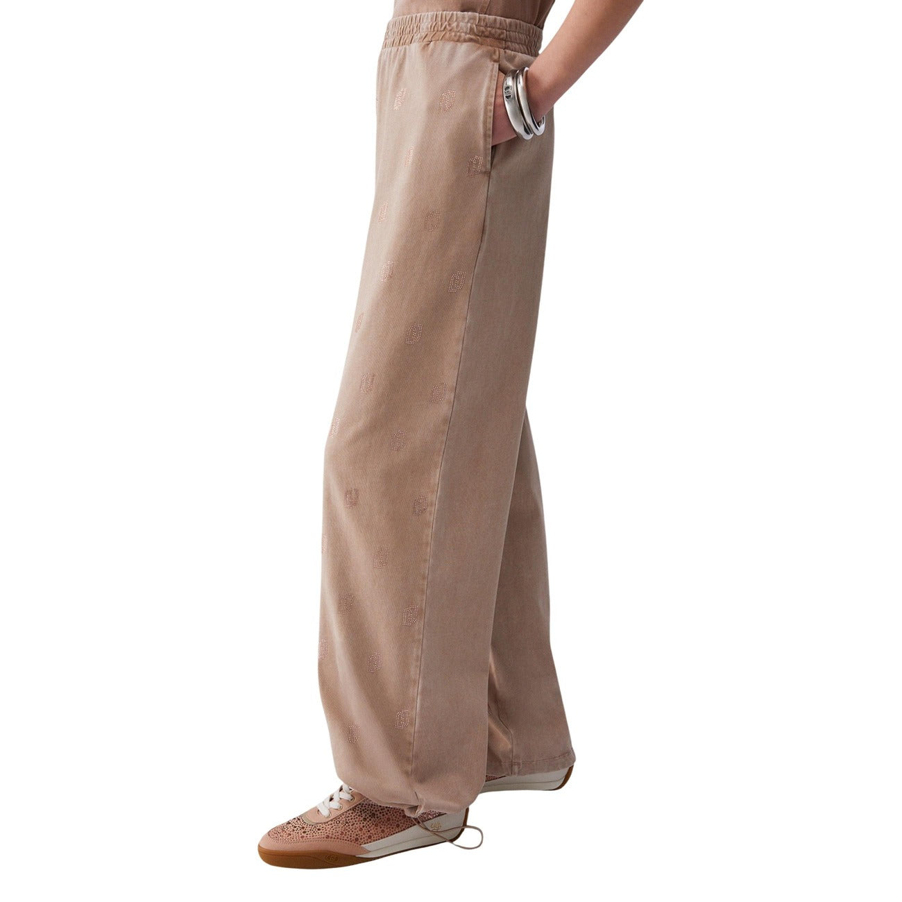 Liu Jo Pantaloni Tuta beige Logati; jogger in jersey di cotone con pattern logo all-over. Comfort premium, vita elastica e stile iconico Liu Jo vista laterale 