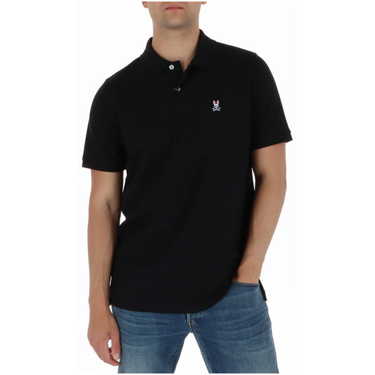 Polo Psycho Bunny Nera; 100% Cotone Pima Peruviano. Tessuto piqué a maglia romboidale, bottoni in madreperla, logo ricamato e colletto anti-arrotolamento. Qualità sartoriale Made in Peru, traspirante e resistente. Vista frontale 
