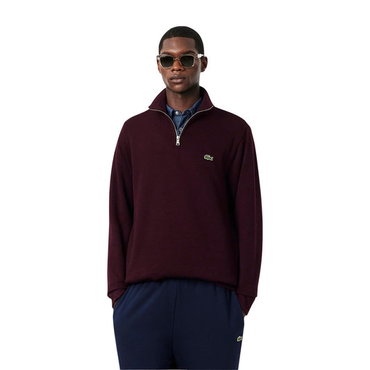Felpa sportiva da uomo Lacoste in cotone bordeaux, con maniche lunghe, collo alto con cerniera e iconico coccodrillo ricamato sul petto.