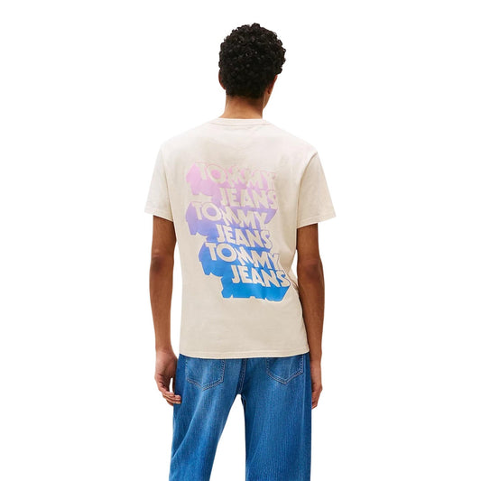 T-shirt Tommy Hilfiger Jeans Beige; 100% Cotone Organico. Grafica New York City stampata, vestibilità regular, scollo tondo. Capo iconico della collezione Primavera/Estate, stile preppy americano.