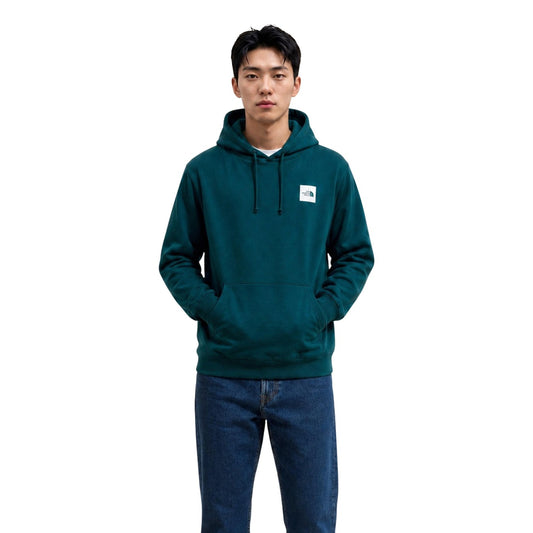 Felpa The North Face M BOX HD REG HD uomo verde NF0A8JAX. Felpa casual in cotone felpato con cappuccio, tasca a marsupio frontale e stampa logo The North Face Box sul petto, abbigliamento uomo mezza stagione.