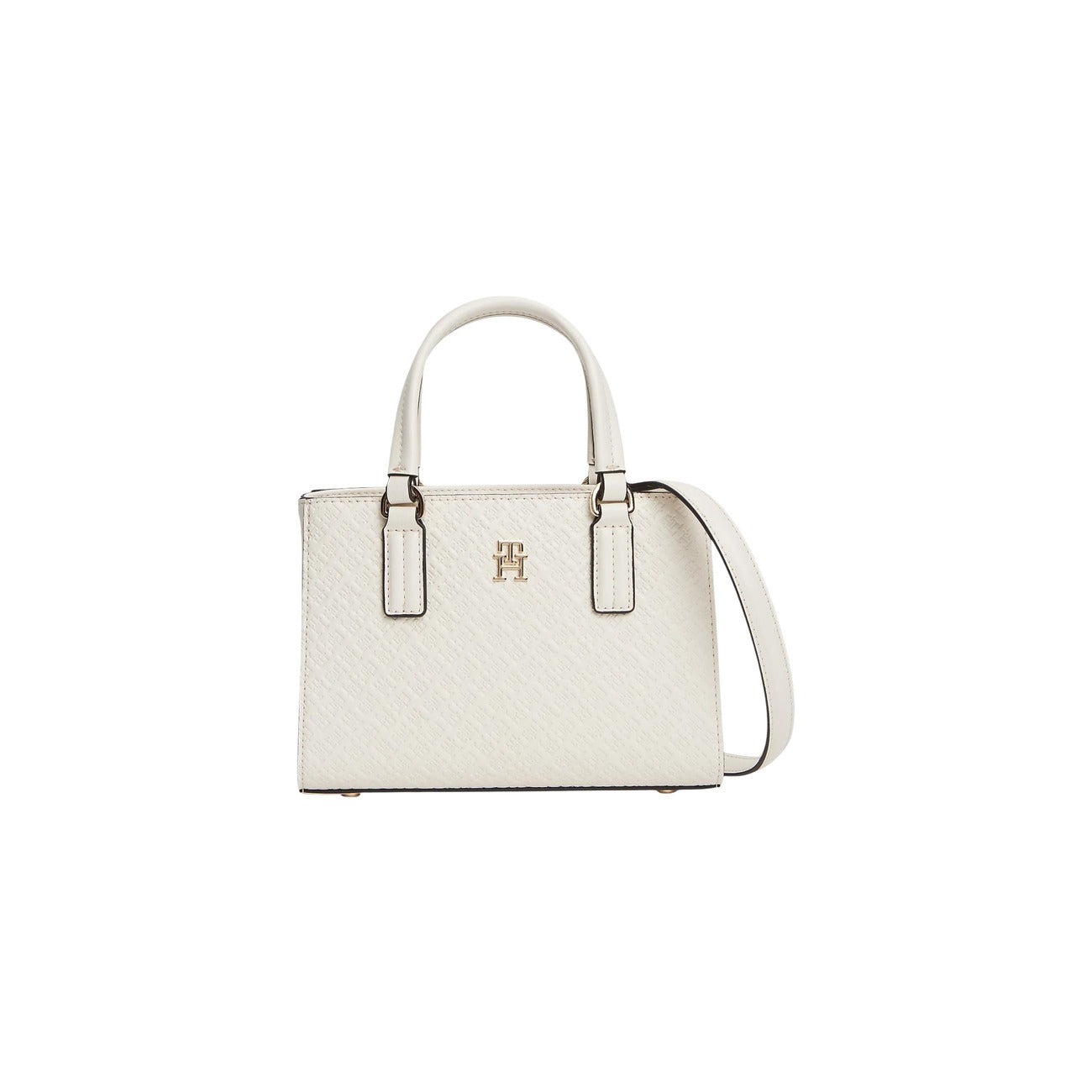 Borsa Tote Tommy Hilfiger Monogram; 100% Poliuretano. Doppio scomparto, chiusura magnetica, tracolla rimovibile. Finitura in rilievo con loghi TH. Capienza 1,5 l. Un accessorio iconico e versatile per ogni outfit. Colore bianco