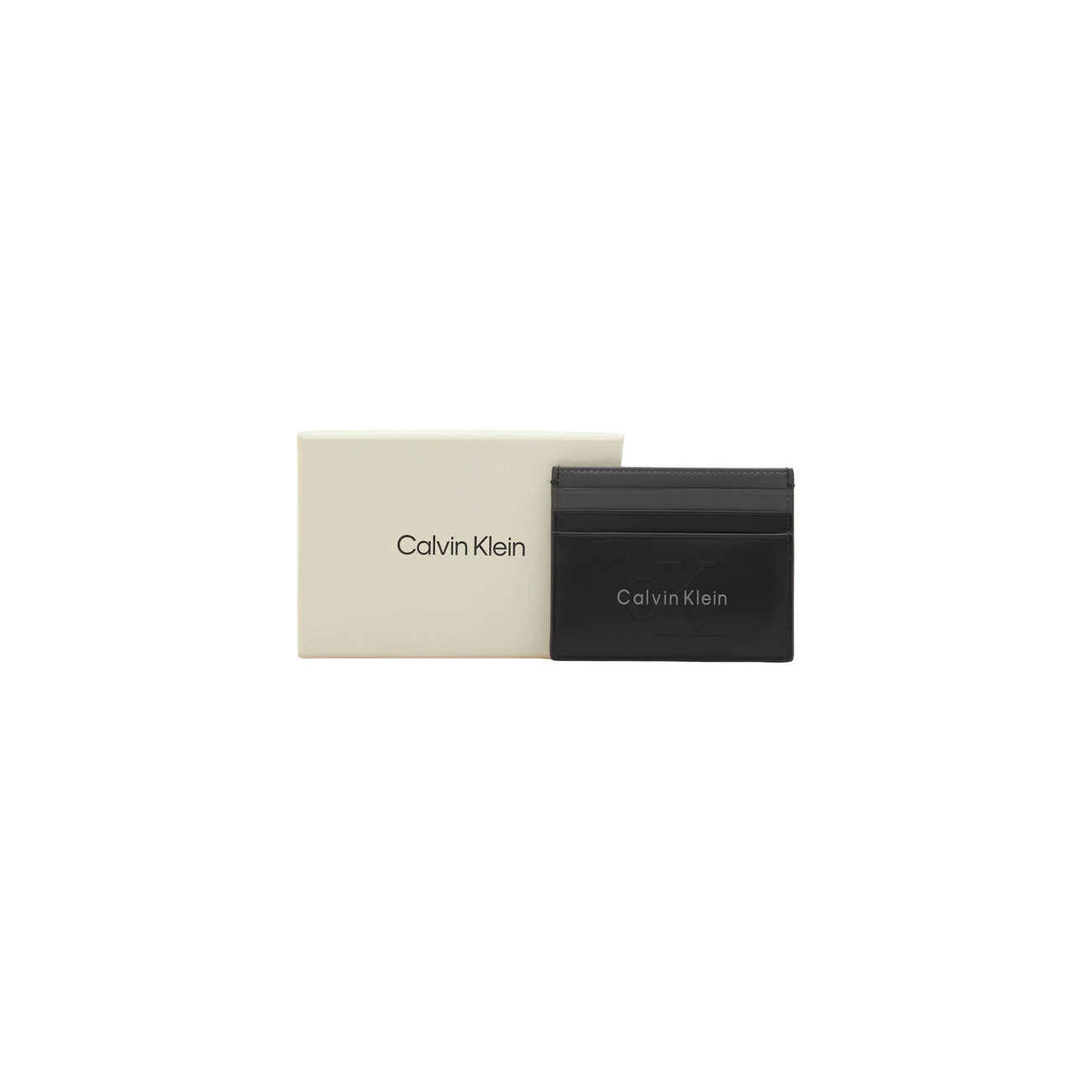 Portacarte in Pelle Calvin Klein; Nero. 100% Vera pelle, scomparti porta tessere, tasca con cerniera, logo in rilievo. Profilo ultra-slim (0,5 cm), stile minimal e funzionale 4 stagioni. Vista prodotto con scatola 