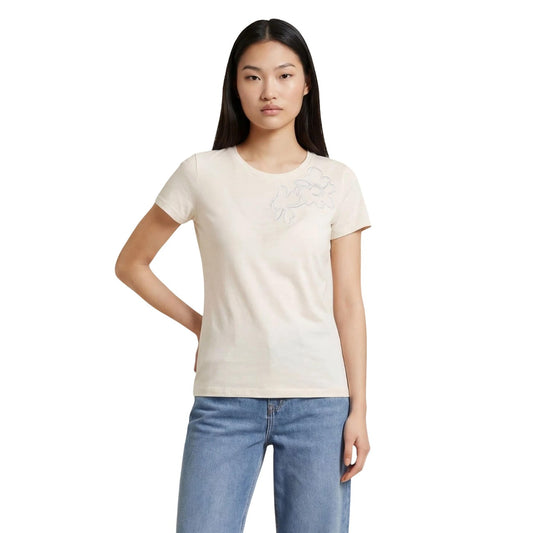 Liu Jo T-shirt ECS Moda; 100% cotone, decoro floreale ricamato con applicazioni luminose. Stile femminile e comfort quotidiano. Colore beige chiaro. Vista frontale 