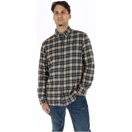 Camicia a maniche lunghe da uomo Timberland in popeline di cotone biologico a quadri neri, vestibilità regular con colletto button-down e logo ad albero ricamato sul petto.