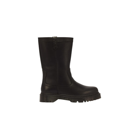 Stivali neri donna Dr Martens Anistone Pull On Wanama 43165001. Stivaletti biker calzata rapida in pelle nera satinata con fibbie decorative, tacco largo 4 cm, tiranti logati e cucitura gialla.