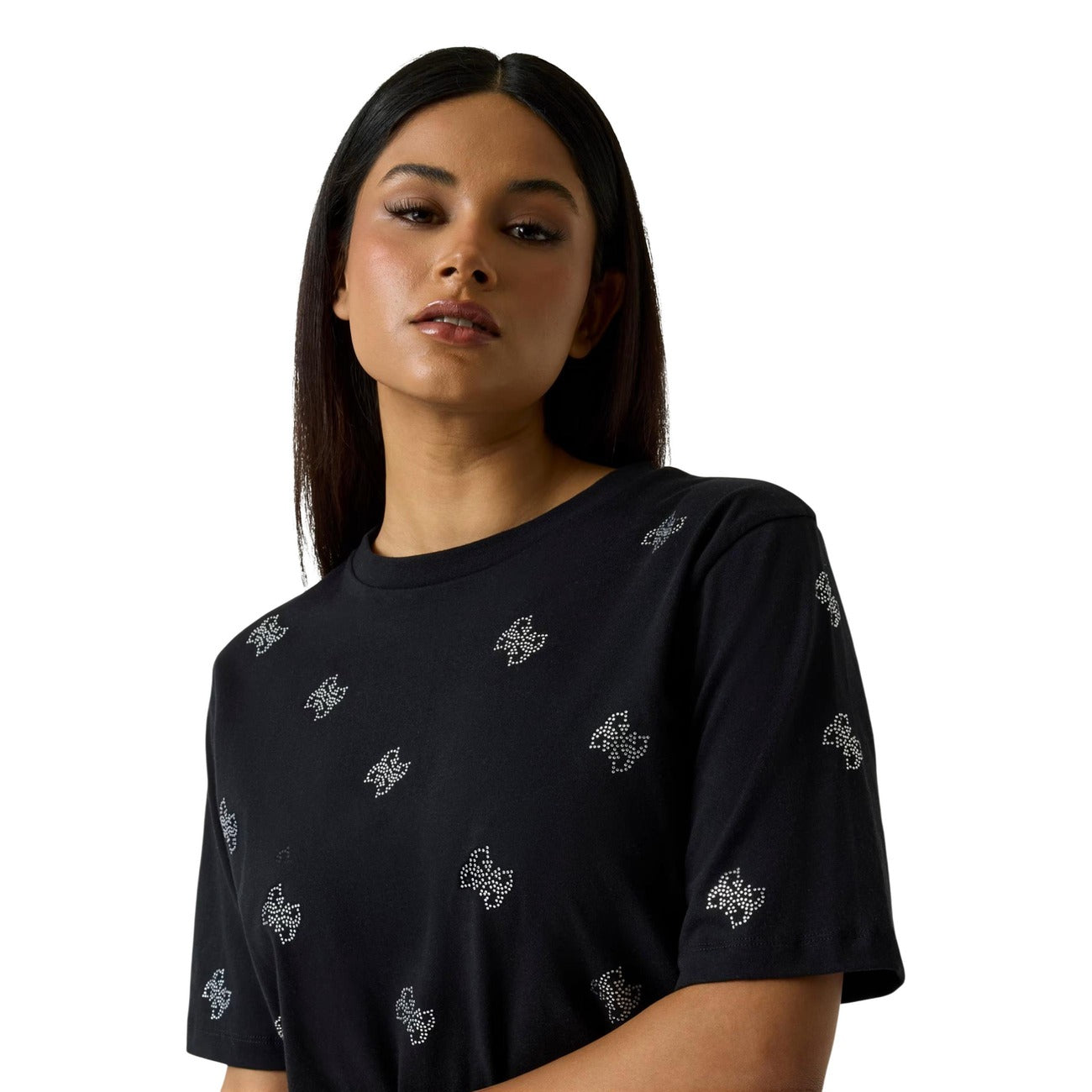 T-shirt Guess Silvy Nera; 100% Cotone. Motivo 4G con microstrass, vestibilità ampia (wide fit), scollo tondo. Capo versatile della linea Guess Active, stile glamour-casual. Dettaglio logo 