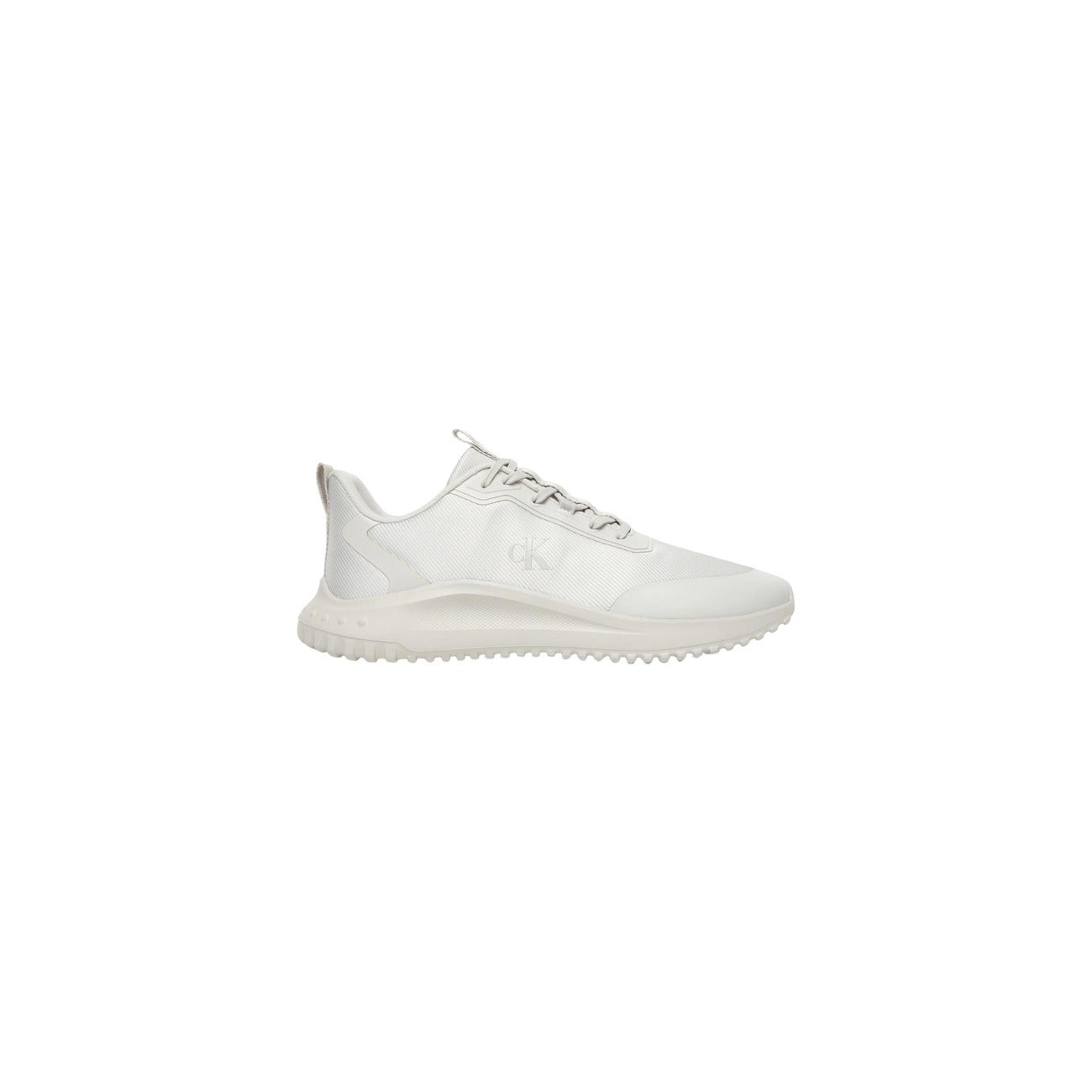 Sneakers Calvin Klein Mesh; Bianco. Tomaia in rete tecnica, finiture termosaldate, suola in EVA ultraleggera. Calzata a calzino, traspiranti e performanti, collezione Primavera/Estate. Vista Laterale 