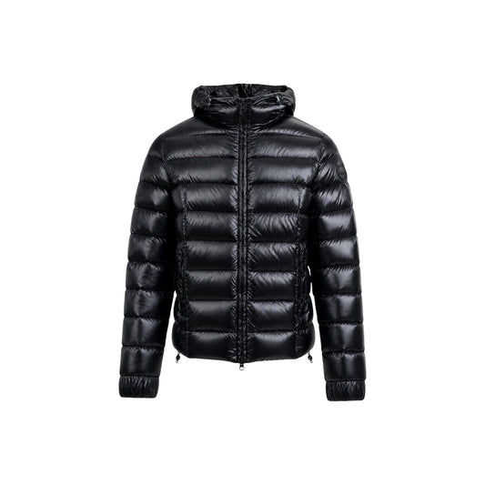 Piumino Colmar Originals uomo nero lucido 12000071 con cappuccio. Giacca trapuntata pesante in 100% poliammide idrorepellente e antivento, normal fit con tasche con zip per autunno e inverno.