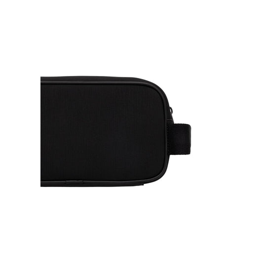 Pochette Beauty Uomo Tommy Hilfiger TH Foundation; Nero. 100% Poliuretano effetto pelle, chiusura con zip superiore, maniglia laterale per il trasporto e logo in rilievo. Misure compatte e capienti (22x12x8 cm).