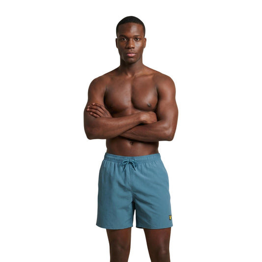 Costume boxer Lyle & Scott blu uomo SH1204VB. Pantaloncino da bagno uomo blu mare e piscina in nylon poliammide leggero e traspirante con coulisse in vita e logo aquila ricamato, pantaloncini mare casual.