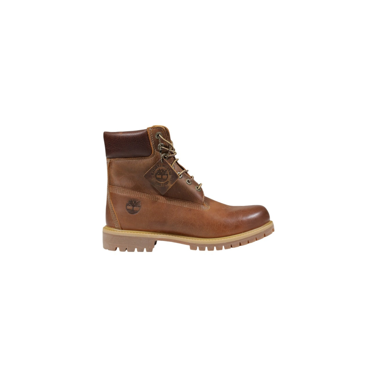 Stivaletto impermeabile da uomo Timberland Premium 6-Inch codice TB127094214 di colore giallo marroncino Wheat. Modello anfibio in pregiata pelle impermeabile con collo imbottito in pelle marrone scuro, lacci stringati e suola carrarmato.