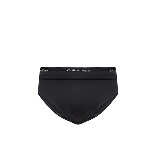 Slip Mare Calvin Klein; Nero. 83% Polipropilene, 17% Elastan. Vita bassa, banda elastica logata, interamente foderato. Tessuto tecnico anti-umidità e ultra-dry. Vista stesa 