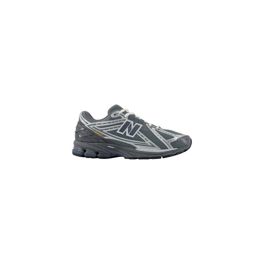Sneakers da uomo New Balance 1906 blu heron blue e vintage indigo con tomaia tecnica completamente sintetica e inserti traforati a rete mesh. Scarpe sportive dal design ergonomico e dettagli grafici dinamici. Vista laterale 