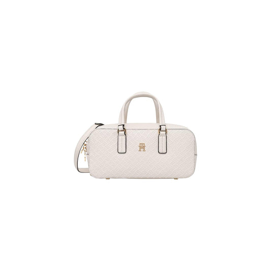 Borsa Tommy Hilfiger Monogram; Finitura in rilievo. Chiusura con zip, scomparto principale con tasca interna, tracolla removibile. Dimensioni 28x13,5 cm. Design iconico nero con dettagli dorati, ideale per ogni occasione. Colore bianco vista frontale 
