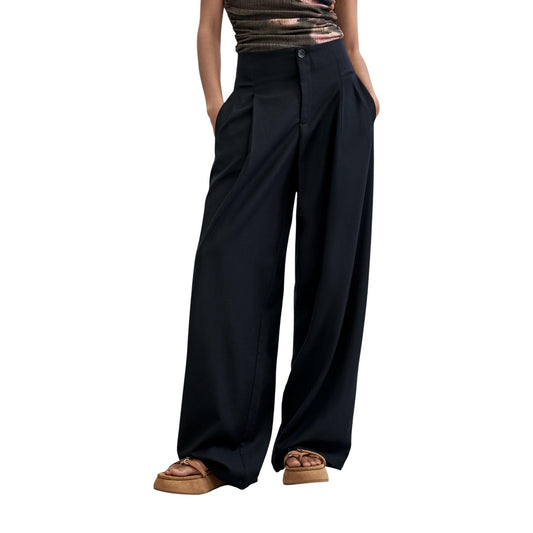 Pantaloni Desigual donna blu navy modello PANT_LUCIA. Pantalone lungo ed elegante a gamba larga in tessuto misto con lana e poliestere riciclato, caratterizzato da pinces sul davanti, tasche e stile casual-chic classico.