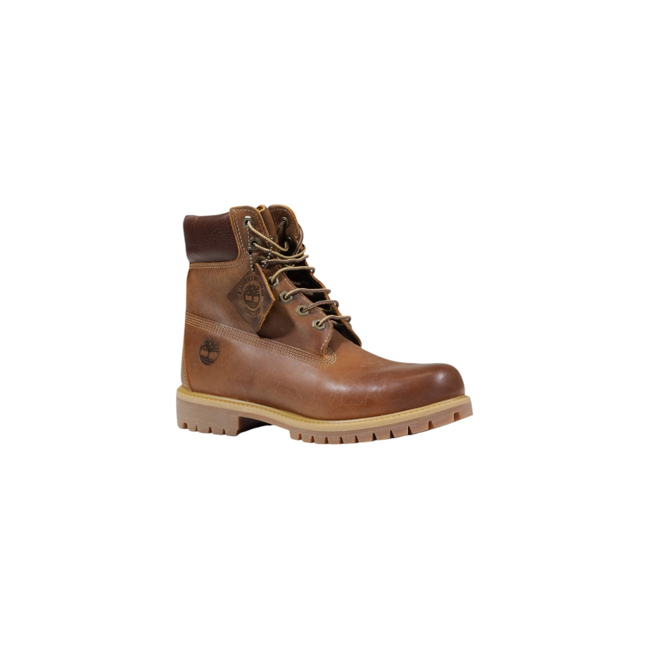 Stivaletto impermeabile da uomo Timberland Premium 6-Inch codice TB127094214 di colore giallo marroncino Wheat. Modello anfibio in pregiata pelle impermeabile con collo imbottito in pelle marrone scuro, lacci stringati e suola carrarmato.