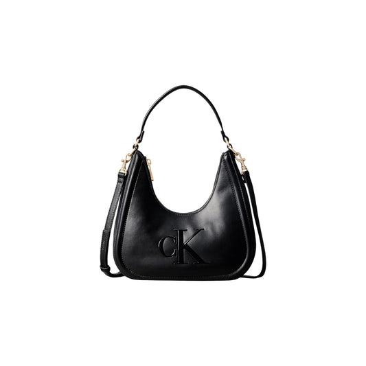 Borsa Mezzaluna Piccola Calvin Klein Bold; Nero. 100% Ecopelle poliuretano, manici corti e tracolla removibile, chiusura con zip. Dimensioni compatte (25x25,8 cm), stile minimalista e femminile 4 stagioni. Vista frontale con tracolla