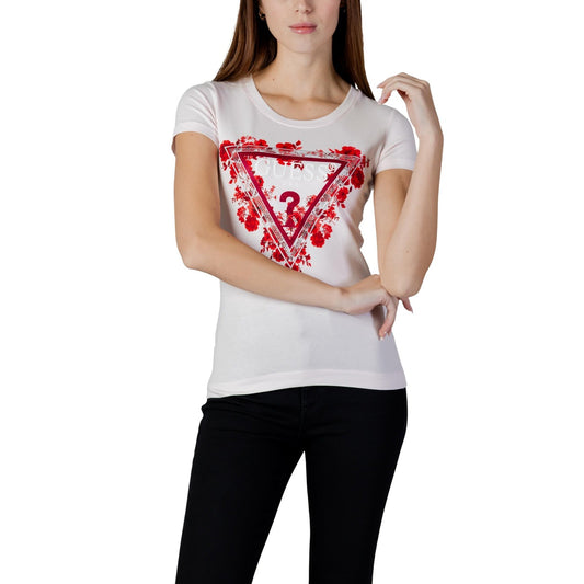 T-shirt Guess Rosa Chiaro; 95% Cotone, 5% Elastam. Logo triangolo con fiori, vestibilità slim, maniche corte. Ideale per look casual-chic Primavera/Estate. Vista frontale 