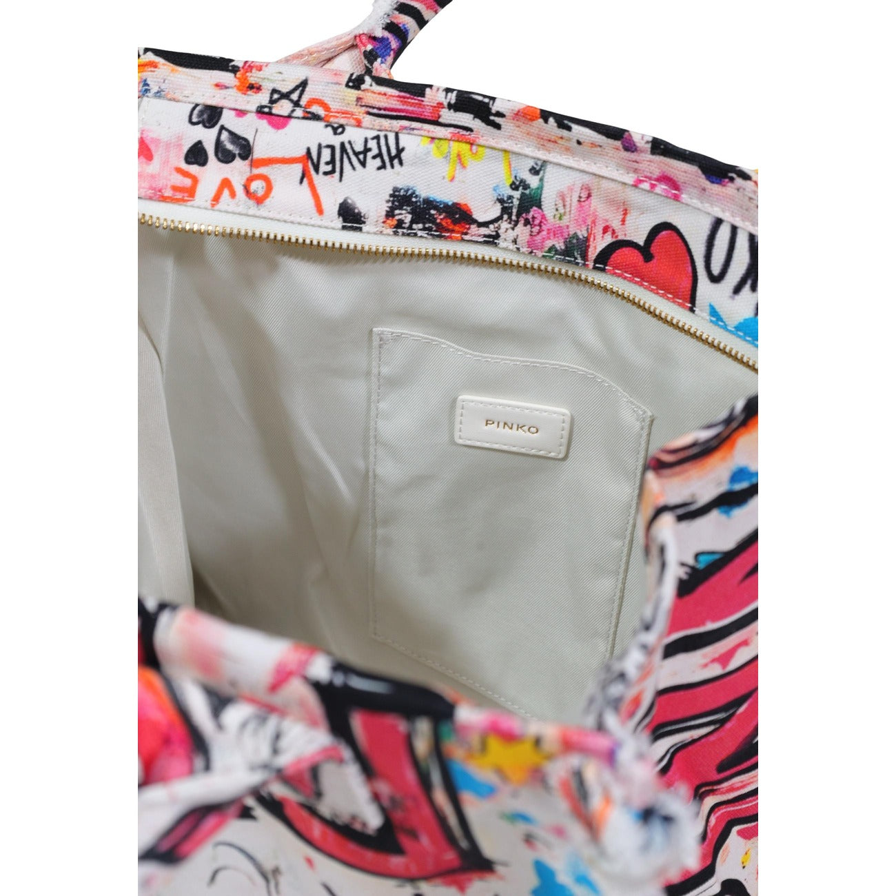 Borsa Shopper Pinko Canvas; 100% cotone, stampa street art, bordi sfrangiati, formato grande. L'accessorio must-have versatile e originale.