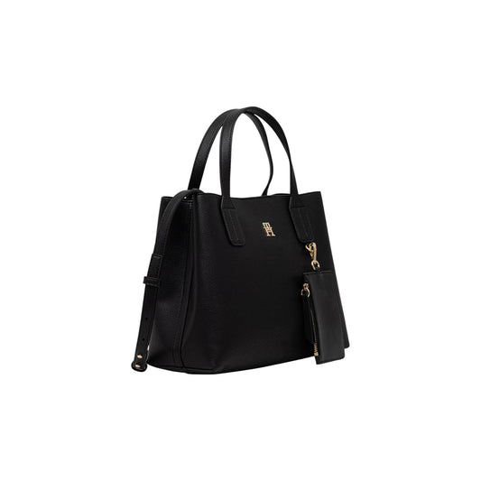 Borsa Satchel Donna Tommy Hilfiger; Nero. Finitura granata, chiusura con zip, doppi manici, tracolla regolabile e mini pochette esterna rimovibile. Dettagli in metallo oro lucido, misure capienti (32x28 cm), stile strutturato. Laterale frontale 