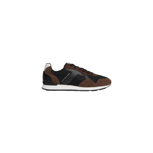 Sneakers Tommy Hilfiger uomo marroni FM0FM06001. Scarpe da ginnastica sportive stile running in poliestere ed ecopelle, con sezioni traspiranti in mesh, suola sagomata e logo Tommy metallizzato, collezione autunno inverno.